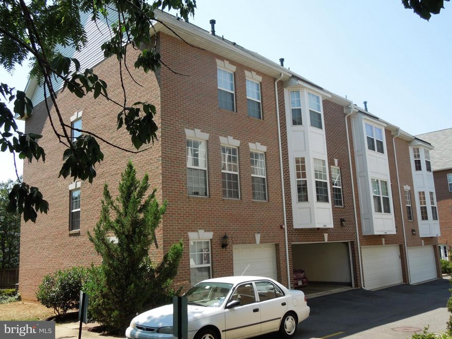 Bus Stop is in front of the Townhouse Complex. Walk to Courthouse Metro, Shopping and Entertainment. Luxurious 4 level unit in the sought after Courthouse Square sub division. 3 BR, a den, 31/2 bath with 2 car garage with gourmet kitchen with granite counters and stainless steel appliances, washer and dryer. Brand new carpet and refinished hardwood floors. 2 year lease preferable. Available now