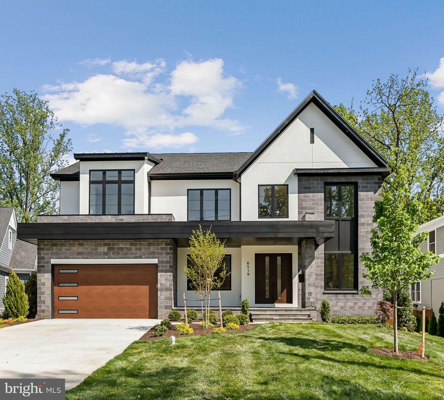 BRAND NEW HOME by award-winning Classic Homes of MD in sought-after Whitman District is now complete and a furnished model home.  This expansive home with in-ground swimming pool features over 6,500 sq feet of living space carefully designed for the modern lifestyle – including a main level in-law suite and finished lower level. 

The interior architecture can best be described as a contemporary vision of mid-century modern design.  A curated selection of elements throughout pay tribute to the era, creating a warm and organic atmosphere. Refreshing walnut stains and paint colors are further enhanced with the choice of tiles with natural movement, and decorative lighting to heighten the experience.    Thermador appliances, Brizo kitchen faucet,  and stylish designer light fixtures from Visual Comfort, Vesper and more exude a sense of timelessness, while ensuring the dependability of your home for years to come.  ONLY NEW HOME ON THE MARKET IN THIS PRICE RANGE WITH A POOL!