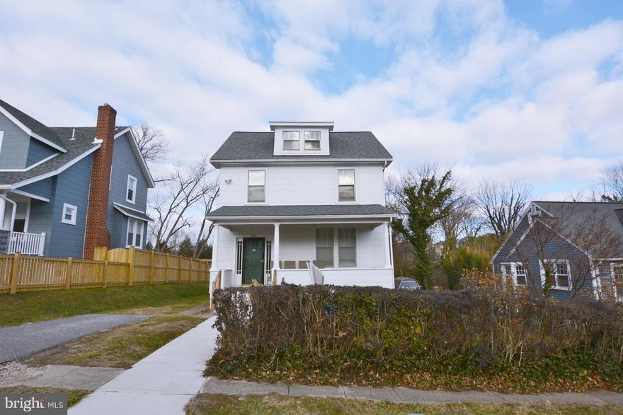 Main level offers hardwood flooring, 9' ceilings, large living area. Kitchen has granite counters. Enclosed back porch. Upper level offers 3 Bedrooms and full bath along with stairway to another upper finished level. Basement is partially finished to include a full bath, laundry area and room for additional improvement. Large back yard with detached garage. New Roof and Furnace installed approximately four years ago.  Home needs TLC.  Conveniently located to public transportation, schools and shopping. Home is in need of TLC. Seller is offering a $5000.00 credit toward replacement of windows upon settlement. *** Home will be sold in "As Is" Condition.