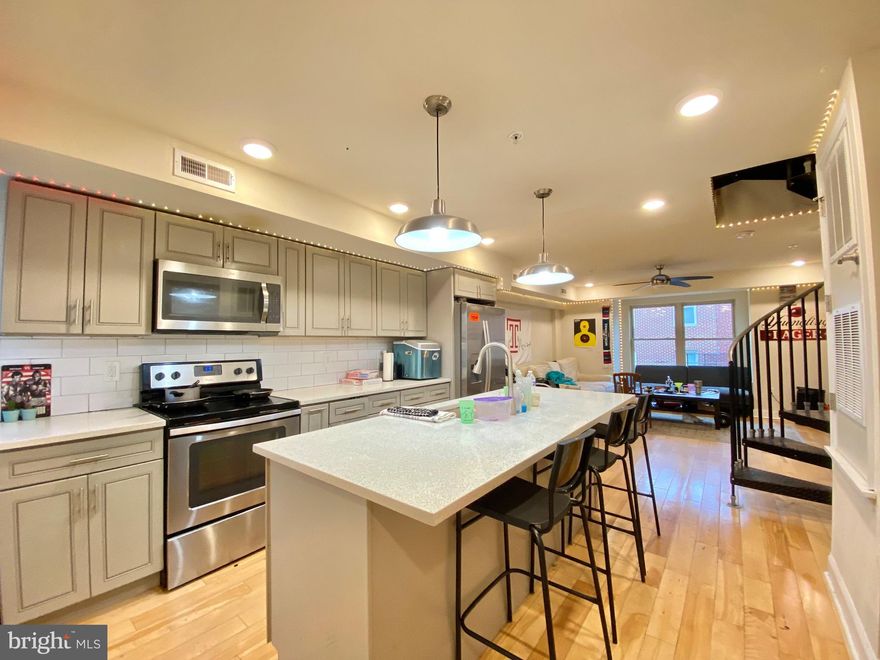 Available for 2024-2025 Temple Academic Year! One of the few 4 bed/2.5 bath apartments with rooftops off campus!

Here is why this place is something that might be perfect for you. First of all, it is located on one of the most popular blocks for Temple students. One of the best places to live at Temple for the best college experience. Bonus! Only 10 min walk to the main campus, and 2 min to the best parties in the area. There is a mom-and-pop shop right around the corner that has one of the best breakfast, lunch, and dinner options as well as day-to-day items.  

Secondly, it is a beautiful new construction with a gorgeous kitchen & an island, breakfast area, spacious living space, and 2.5 bathrooms! You also have a rooftop with gorgeous Philly views! Central AC and heating, dishwasher, gorgeous island in the kitchen, quartz countertops, and stainless steel appliances. This house has everything for a convenient living experience. Lastly, the price! You can get the place for only $675/room? That's definitely a good value for everything that you're getting. Inquire about the deals and offers we can get you for serious inquiries.