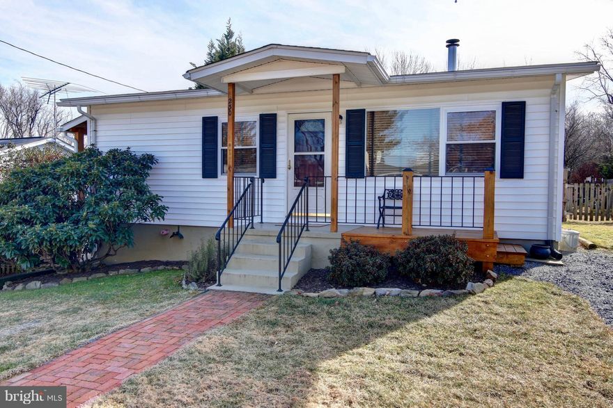 Town of Purcellville ! Check out this cozy home ! Walk to town, fields, school and  community center ! This home affords 2 beds and 1 newly renovated full bath, wood floors, wood stove ! Out side is a fully fenced spacious yard with a fantastic shed with work shop !  There is 2 off street parking areas plus street parking ! Sit on your deck overlooking garden area and big rear yard!