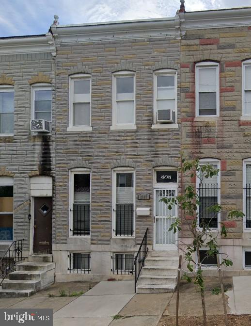 Purchase price subject to third party approval. Rowhome with large room sizes! Spacious living and separated dining room with hardwood floors. Chef's kitchen with stainless steel appliances, glass tile backsplash, and ample cabinet space. Kitchen level laundry, upper level with 3 bedrooms (1 is a walk-thru), 1 full bath, unfinished basement for storage, and rear fenced patio. Home is sold in AS-IS condition.
