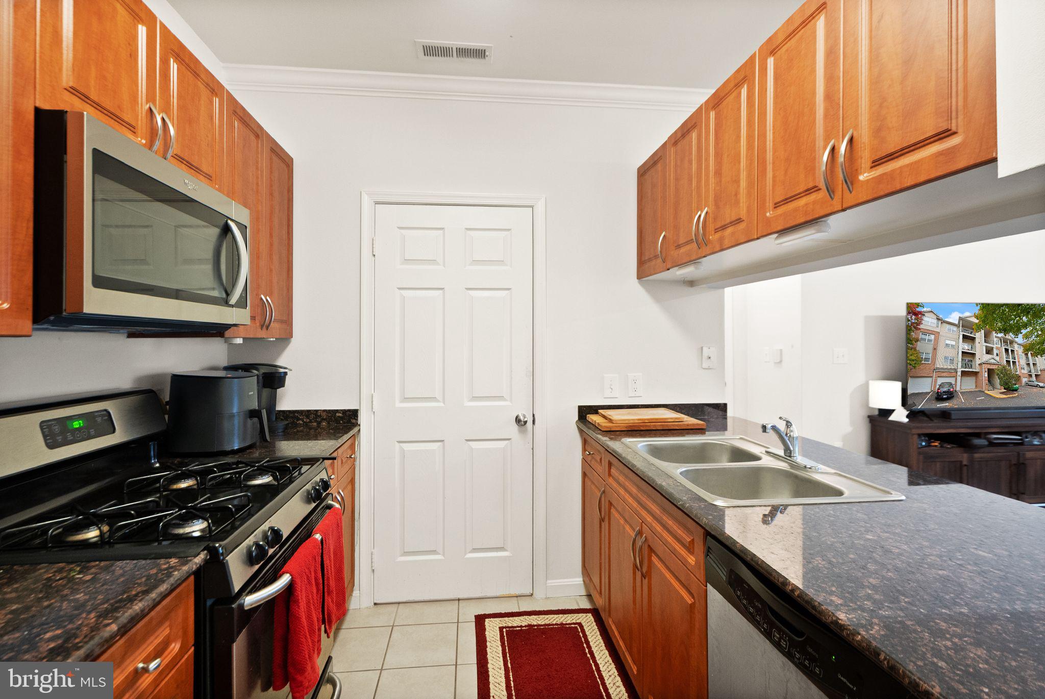 12128 GARDEN RIDGE LANE 203