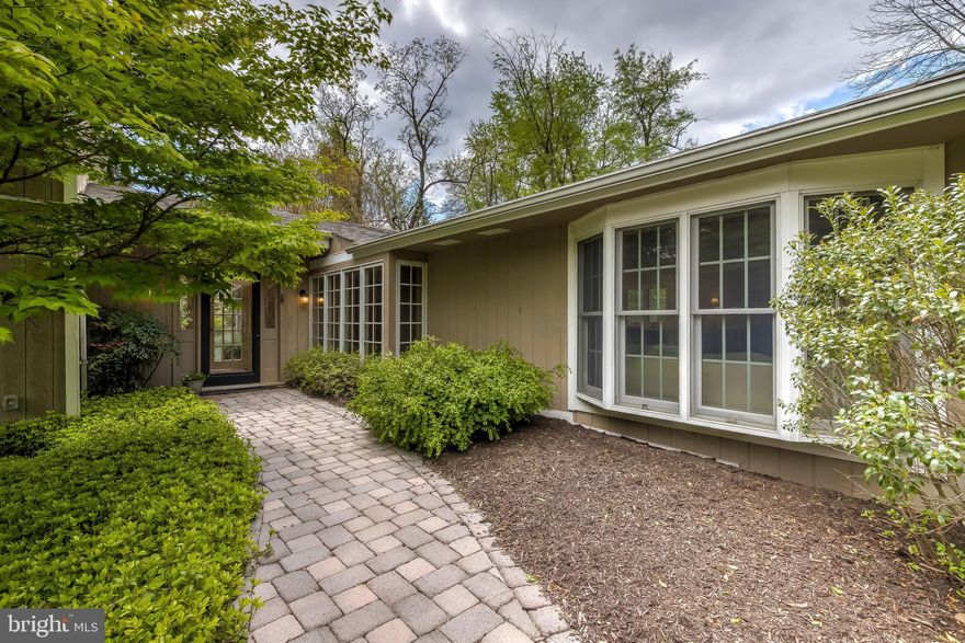 Down a long drive off Padonia Road and located on 1.3 beautiful acres is this nicely kept contemporary.  The home includes a large two-story master wing with a first floor library/study with wood-burning fireplace, exposed wood beams, and loads of bookshelves.  Perfect for working from home!  The second floor of the master wing is a large lofted bedroom with plenty of sitting room too.  Open kitchen leads to a huge family room with wood-burning fireplace, French doors to screened porch and to dining room, built-ins.  A great space for entertaining.  Windows throughout the house to enjoy the privacy of this large flat property.  The landscaping includes a fenced courtyard garden with pond for extra beauty.  There are two separate lower levels including one that has an open walk-out and full bath for extra living space and plenty of storage.  Zoned heating and A/C.  Updated electric throughout.  The house is being sold  As Is  and is priced accordingly so that a new buyer can take an amazing place and make it their own.  Easy to show and flexible closing schedule!