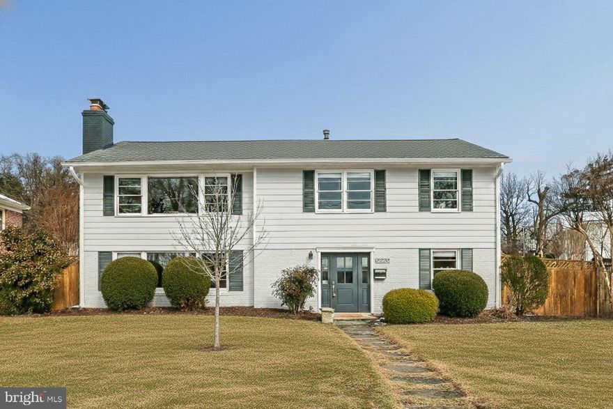 This charming home in the Woodburn neighborhood of Bethesda offers a perfect blend of classic elegance and modern comfort. Lovingly maintained  with thoughtfully designed living space, this residence features four sun drenched bedrooms and three full bathrooms, ensuring ample room for relaxation and privacy. Step inside to discover beautiful hardwood floors that flow throughout the main living areas and bedrooms, complemented by crown moldings in the living spaces that add a touch of sophistication. The beautifully renovated kitchen, which thoughtfully balances aesthetics and functionality, features granite countertops, stainless steel appliances, gas cooking, and a convenient island for meal prep. Enjoy cozy evenings by one of the two wood burning fireplaces, creating an unbeatable ambiance in the living and family rooms. The sunroom adjacent the kitchen and dining rooms brings the beauty of all four seasons indoors while adding multi-functional living and entertaining space. The primary suite boasts soaring cathedral ceilings, a cozy sitting area, three closets (one walk-in),  access to the screened porch, and a renovated en-suite bathroom bathroom creating the ultimate retreat. Outside, the landscaped front yard and spacious, fully fenced rear yard provide a serene setting for outdoor activities. Relax on the screened porch or entertain on the deck, making the most of your private outdoor oasis. Located near vibrant local amenities like downtown Bethesda and the new Westbard shopping center, parks, convenient transportation options and major commuting roads, this property combines serene living with accessibility. Experience the perfect blend of comfort, style, and location in this exceptional property located in the highly ranked Walt Whitman High School Cluster.