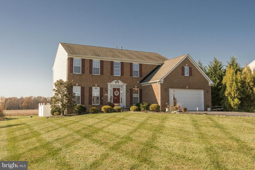 OPEN HOUSE May 21st 1-3pm! Phenomenal 4 bed 2.5 bath brick front in Pelham Manor. Private .72 acre lot. 2-story foyer & hardwoods throughout main level. Kitchen w/ granite tops, island, bar top, & stainless apps. vaulted ceilings in morning room &  fireplace in family room. Huge covered trex deck & paver patio. Master suite w/ walk-in closet & 4 piece bath. 2 car gar,& main fl laundry. Must See!!