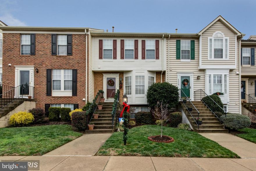 Fantastic upgraded town home with open space behind, brand new roof, all new paint, remodeled kitchen with granite and SS appliances. 2 large bedrooms upstairs, each w/ full bath PLUS unpermitted 3rd bedroom in LL with full bath as well - just needs closet. 2 assigned parking spaces. Nice deck and fenced rear yard with no one directly behind!