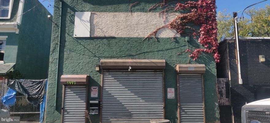 **MILL CREEK COMMERICAL PROPERTY FOR SALE RIGHT OFF 46TH and LANCASTER** to total square footage is  9847 sf.  Seize the opportunity to buy a large portion of a block at a great price. This commercial building is a former auto body shop and is being sold with (922-26 N 46th Street MLS#PAPH2412314 -and- 918-920 N 46th Street MLS# PAPH2412136) It is a mix of lots and 1 commercial building. Must buy all together. Great location. Buyer is responsible for the Philadelphia Resale Certificate. All offers will be presented. A 5000  escrow is due within 48 hrs. of a signed agreement of sale. Take a drive by or call for a tour of the structures.