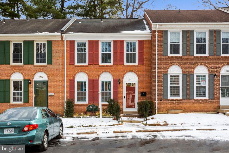 Updated three level 3BR/2.5BA brick townhome in convenient Reston location! Renovated kitchen w/  granite, stainless appliances appliances, cabinets, custom backsplash and new floor. Renovated primary bath. Lower level den & family room with extensive built-ins.  Living room opens to a nice slate patio and private treelined fenced yard. Replacement windows, replacement fan motor in AC-2019. Newer hot water heater and several new light fixtures. Deepwood is not part of the Reston Association so there is no additional yearly fee.  Community has its own private pool, tennis courts, playgrounds and easy access to the 55 miles of trails in Reston right outside your door. Assigned parking plus ample guest parking.  Conveniently located within minutes to Hunters Woods Shopping Center, Wiehle Metro, Reston Town Center, Fairfax Cty Pkwy, and Dulles Corridor. Hunters Woods ES pyramid. OH Sat 2-4pm