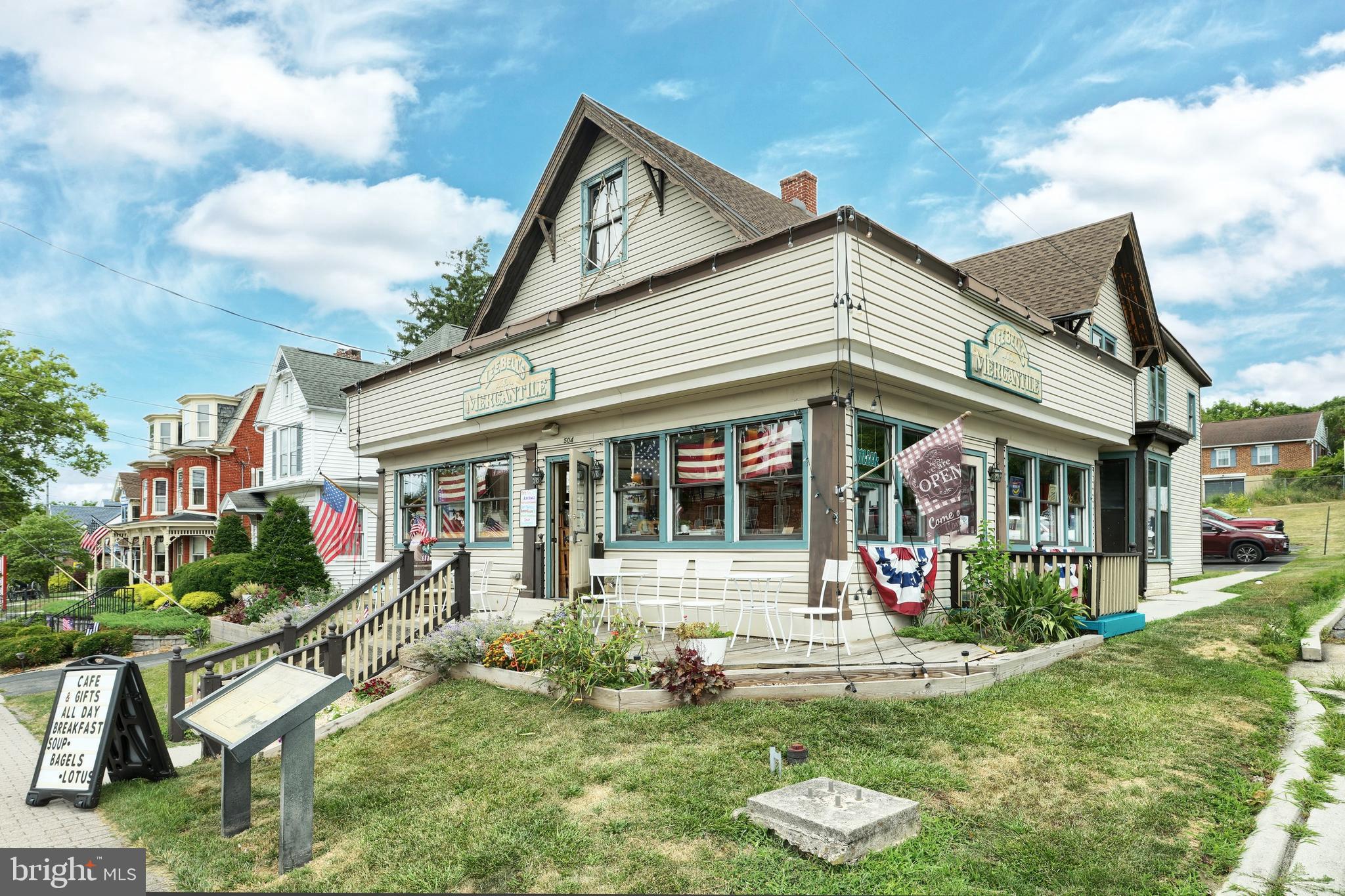 Incredible location! In the heart of Historic Downtown Gettysburg Tourist District. This Landmark Building features a 1450 Square Ft. Store Front, with glass display case, check-out counter, full bath, natural gas, central air, victorian bump-out display windows, & updated flooring. 2nd story offers 2 apartments, Unit #2 features 2 bedrooms, full bath, living room, dining area, and kitchen with appliances. (Currently on a month to month lease ). Unit #3 is a one bedroom efficiency with a full bath, and kitchen appliances. (Currently available). Building has rear storage room, Full basement and separately metered electric. Building is nearly maintenance free with brand new (2021) 35 year architecture shingles & vinyl siding. This is large lot with a rear yard and beautiful private paved parking lot with 5 spaces, (Driveway entrance features it own red light for easy ingress /egress) Ownership pride shows throughout Schedule today!