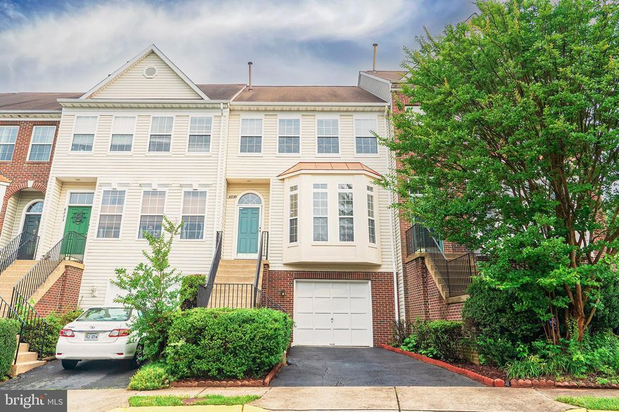 PRICE IMPROVEMENT! Townhouse 3 levels, 1 car garage in pristine condition, minutes to Rt 66, Rt28, Fairfax County PKWY, Shopping Centers, walk to shuttle to Vienna Metro Station.  It is a no Carpet Home! Wood Laminate floor in Living Room and Dining Room, Staircases & All Bedrooms. Living Room has a beautiful Bay Window, filled with sunlight. Gourmet Kitchen combined with Family Room, perfectly designed for family gatherings. It has Granite Couter tops, Kitchen Island, Oak Cabinets, Newer Appliances, New Floor. Spacious Master Bedroom has Luxury Master Bath with Garden Tub, Double Vanities and a Shower. It has a Walk-in Closet, vaulted Ceiling and peaceful view from the Windows. Lower Level is very large for Entertaiment with a Gas Fireplace, Walk-Out to a fully Fenced private Patio. There is a large Deck on Main Level with Benches, Private Panels and Stairs to the Lower Level. Plenty of Visitor Parking Spaces. Brand New HVAC Unit (August 2024)!