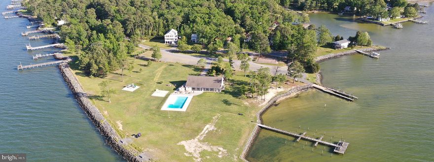Nice wooded lot with septic installed priced to sell.
Enjoy waterfront amenities of Bay Quarter Shores for only $300/year. Beaches, clubhouse, pool, pier/dock, trails and more!