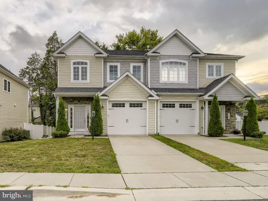 OFFERS DUE 9/18 AT 12PM. Welcome to 302 Grace Way - a hidden gem in the heart of Laurel. This gorgeous 3 bedroom, 3.5 bath duplex is a rare find with major curb appeal, a one-car garage, and all new carpet and paint. The home is only five years young. The lovely foyer leads you to a front powder room with hidden laundry. The open concept living room/kitchen with center island is perfect for gatherings, and leads out to a relaxing, low-maintenance deck. Upstairs you’ll find the primary bedroom with a large walk-in closet and private bath with separate shower and tub. Two other nice sized bedrooms and a hallway bathroom complete this floor. The lower level features a recreation room, a third full bathroom and additional storage. There’s also a kitchenette and private back entrance, great for an in-law suite. You’ll love the location of the home, tucked away in a quiet subdivision of only a dozen homes, but in close proximity to all of the shopping and dining in and around Laurel.  You'll also have super quick access to I-95, Route 1, MARC train and more. This home is truly a must see. Schedule your showing today.