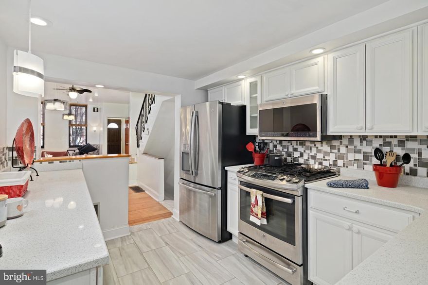 Amazing 3-story home in the prime pocket of Northern Liberties with new granite kitchen, large deck off of the 3rd floor, and luxurious amenities throughout for a fair and reasonable price!! Enter past the gorgeous red brick facade into a large and open living room with hardwood floors, tall ceiling height and a large dining area just off of the new kitchen. The kitchen has granite counters, stainless steel appliances including a high end slide in range, tiled backslash and new tiled floor. There is a bathroom off of the kitchen and a door to an outdoor area.The lower level is finished and can be a 2nd living room, den or 4th bedroom space. The 2nd floor has two nice sized bedrooms with good closet space and natural light. the master suite is on the 3rd floor and has access to a huge deck with city views, a small kitchenette with fridge which is perfect for a coffee station and a bathroom. This home has been in the same family for man many years and is perfect for anyone who wants to be at a primo location in one of the city's most popular neighborhoods. walk-able to lots of great restaurants, pubs, parks, shops and more!!