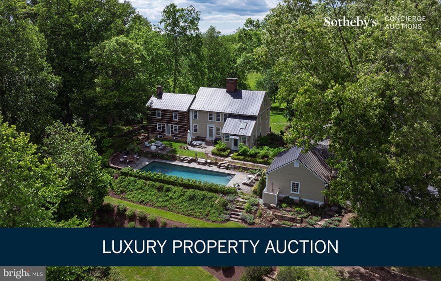 LUXURY PROPERTY AUCTION: 15–27 JANUARY.
Accepting Starting Bids Through 14 January.
Starting Bids Expected Between $1.5M–$3.25M.

Earn an incentive by 14 January.

A rare opportunity to own an extraordinary piece of Virginia history on this private 37-plus acre estate minutes from historic downtown Middleburg. The Nathan Ayer House, a distinguished Colonial built in 1790 in Connecticut and meticulously relocated to hunt country, showcases unparalleled craftsmanship with nine original stone fireplaces, hand-hewn exposed beams, and authentic period hardware throughout. Lush perennial gardens and an inviting heated pool create an idyllic retreat, while the late 19th-century bank barn—constructed from hand-hewn oak and poplar with fieldstone—offers limitless potential for equestrian pursuits, entertaining, or creative endeavors. Direct frontage along Goose Creek provides ultimate seclusion on this incomparable property where architectural heritage and countryside elegance converge in perfect harmony.