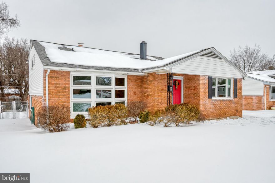 Move-in ready with style and character! Welcome home to this beautifully updated four-level split featuring gleaming hardwood floors and fresh paint throughout, along with 4 spacious bedrooms and 3 full bathrooms. The living room is an instant showstopper, highlighted by a striking iron-baluster staircase with Craftsman-style newel posts, soaring cathedral ceilings, and dramatic floor-to-ceiling panoramic multi-panel bow windows installed in 2022. The bright, updated kitchen (2013) offers warm wood cabinetry, granite countertops, and stainless steel appliances, including a gas range with vent hood (2018), plus generous counter space and an easy flow into the dining room. The inviting dining room features classic wainscoting and crown molding, creating a timeless setting for gatherings. Upstairs, you’ll find three spacious bedrooms with hardwood floors and ceiling fans, including a generous primary suite with an updated full bath. Additional bedrooms share a nicely finished hall bath.

The lower level offers a comfortable rec room with a wood-burning fireplace and walk-out access to the backyard patio, along with an additional bedroom and full bath. The lowest level provides abundant storage and utility space—ideal for a workshop, home gym, or future finishing, and includes a separate laundry area with new washer and dryer plus an enclosed storage room.

Outside, enjoy a level backyard with a concrete patio and storage shed, while the saucer magnolia out front adds charm and curb appeal. A wide concrete driveway leads to the side entrance for easy access. Notable updates include a roof (2019), sewer line and exterior French drain (2024), and windows, electrical panel, and LED lighting (2022). Conveniently located in Pikesville, this home offers easy access to shopping, dining, and everyday amenities, with quick routes to Towson, Owings Mills, and downtown Baltimore, all tucked into an established neighborhood with a suburban feel.

This property won’t last, don’t miss your chance to call it home!