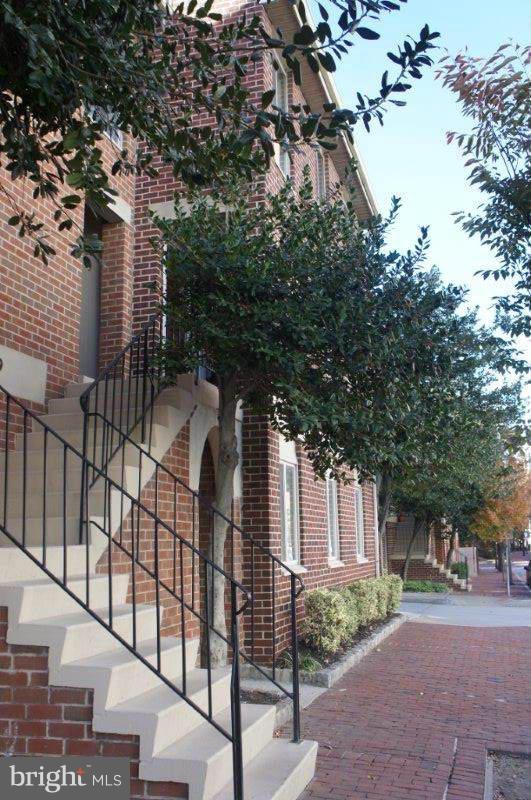 *Rarely available in Harbor Way East*End unit with lots of windows, on second floor !This 2 BD. 2 BA condo is just steps away from Inner Harbor.Parking inc.,additional parking avail.by permits for nominal fees. Cheerful, newly painted with new hardwood flooring, this home is close to famed BALTIMORE restaurants,museums & other attractions ! Great location!! Windows being replaced.