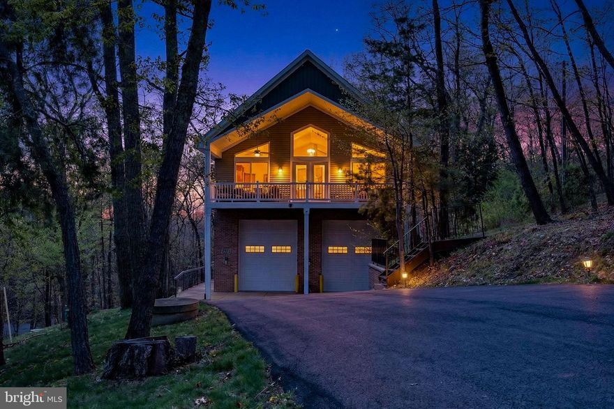 Incredible views, a flexible layout, and a one-of-a-kind design. This home stands out.
 
Built in 2022 and set on a private, wooded half-acre lot in Bull Run Mountain Estates, this custom home offers a unique and versatile floor plan with multiple living and entertaining spaces, two kitchens, and scenic mountain views.
 
The main level features an open-concept design with a modern kitchen, large island, custom finishes, and direct access to the deck—ideal for everyday living and entertaining. Natural light and clean finishes carry throughout.
 
Additional levels provide flexible space for bedrooms, office use, or a second living area. A separate lower-level setup with its own kitchenette and full bath offers an ideal option for guests, multi-generational living, or private workspace.
 
The oversized garage provides exceptional room for vehicles, storage, or hobbies—an uncommon and highly functional feature.
 
Key features:
 
3 bedrooms and 3 full baths
Two kitchens with flexible multi-level layout
Expansive deck with wooded views
Oversized garage with workshop potential
Built in 2022
Private setting with convenient access to Haymarket and Gainesville