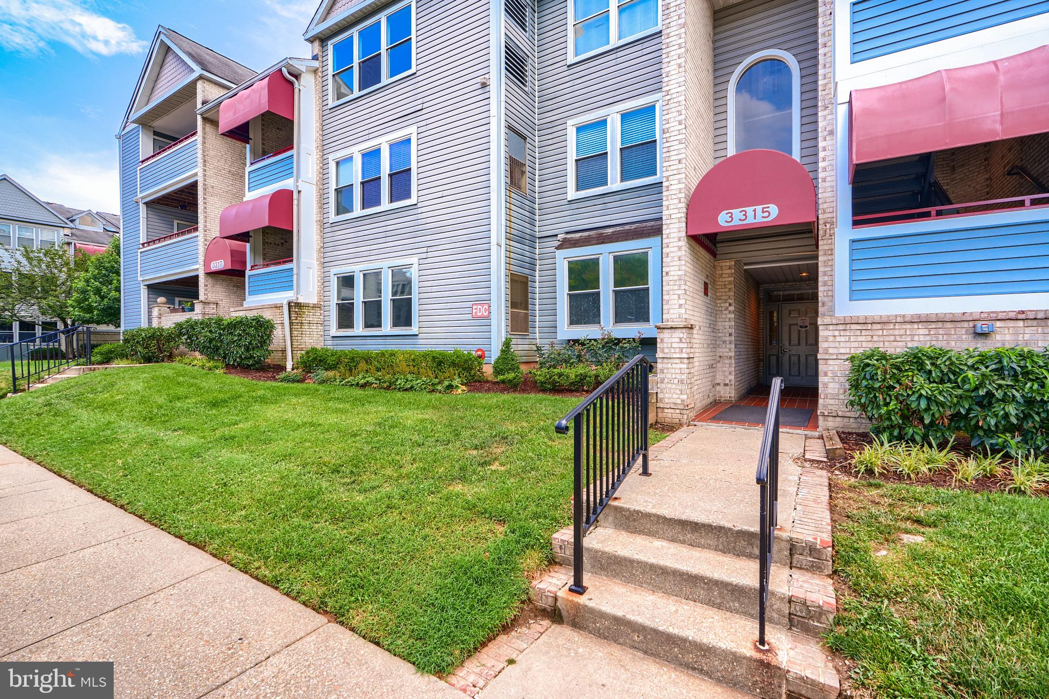 Step into this beautifully updated condo featuring a bright open concept living area with rich hardwood floor, vaulted ceilings, and a contemporary ceiling fan. The spacious living room is anchored by a cozy fireplace. Enjoy a generous size primary bedroom and a modern primary bath. Tons of closets. Expansive sliding glass door that leads into a private balcony overlooking lush greenery. This home is move in ready.