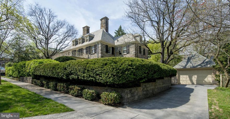NEW PRICE! Stately sun-drenchd stone Georgian in Guilford. Gracious foyer, spacious rms, LR/DR w/FP's, Den. Large kit w/SS, granite, butler's pntry. Elegant MBR w/dress'g, luxe MBA, Fam rm w/FP,  & en suite BR on 2nd fl. 3 BRs/2 BA & study on 3rd. L/L Rec rm. Lovely grounds w/patio,pond & fencd yard. 2-car gar. Convenient to shops, restaurants. Frequent block parties create sense of community.