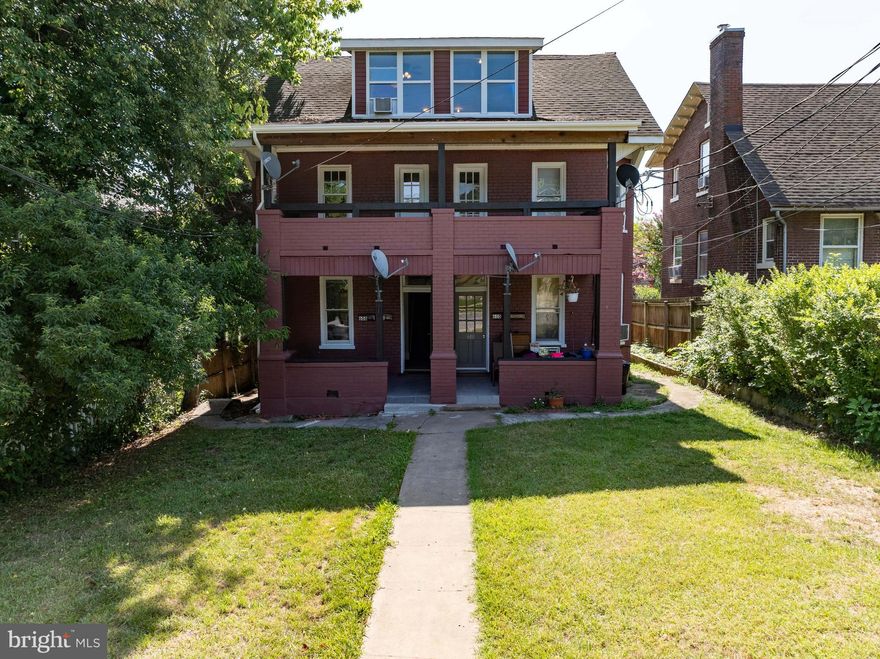 Here's an opportunity to own an all Brick 4 unit building located in a Historic District of Martinsburg overlooking  Boydville.   This classic building has been owned by the same family for over 30 years.  Large main level apartments boast of front and rear porches while the upper units are 2 story with large covered front porches.  Units have been updated.  New windows throughout.  This would make  great furnished unit rentals  while you live in the expansive 2 story upper unit.  Electric is metered separately, with water and sewer having 1 meter.  608 #1 is 2 Bedroom, 1 full and 1 European wet room bath.  The room in the back, accessed from the rear yard, could be a seperate efficiency unit or lock out unit.  Large lot with alley access and covered carport in the rear for parking along with on street parking.  This is truly a great find for investors or owners who want additional income while living in one of the units.   3 of the units are vacant as they have been freshly painted and updated.  Currently 1 occupied unit.