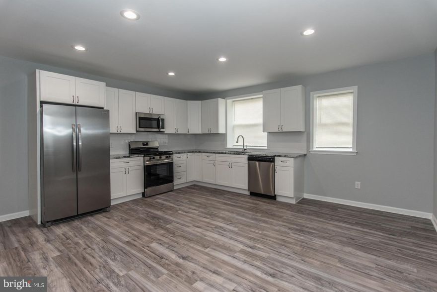 LOOK NO FURTHER!!! Welcome to your beautiful home in the heart of Wissinoming! This 3-bedroom, 1.5 bathroom rowhome offers modern upgrades, thoughtful finishes, and adequate space. Step inside to find an open and inviting layout with brand-new laminate flooring and fresh paint throughout. The sleek new eat-in kitchen is a chef’s dream—featuring white shaker cabinets, granite countertops, and all new stainless-steel appliances. Enjoy your newly renovated bathrooms, one on the 2nd floor and a half bath in your completely finished basement with fresh paint and new laminate flooring. The large fully finished basement is perfect for family fun and entertaining friends making those lasting memories. Other recent upgrades include a new roof, brand-new furnace system, and windows. Relax on the front patio. This home blends classic Philadelphia charm with modern finishes and is just minutes from public transportation, shopping, parks, and major roadways. Don’t miss out on this great opportunity!! Schedule your showing today and call it home tomorrow!