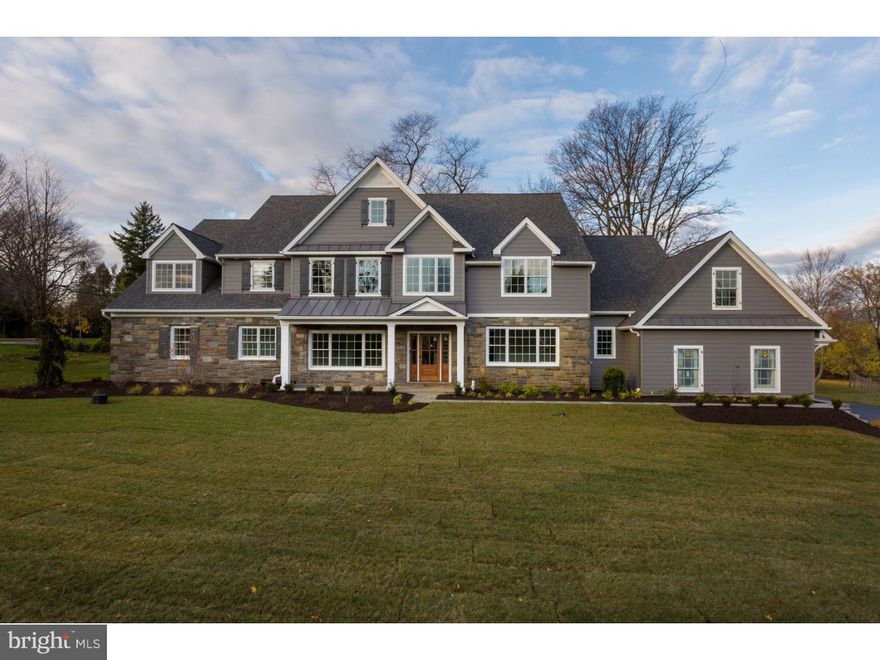 Another spectacular two-story center hall colonial masterpiece built by Sposato Home Builder. What once was a modest, stone-faced rancher sitting on this fabulous property, is now transformed into a majestic newly constructed home. The main level features an eat-in gourmet kitchen with stainless steel appliances, a large center island with quartz counter-tops and subway tile back-splash. The main level has an open concept layout situated and styled to be perfect for entertaining. With sight-lines from the kitchen through the sun-lit morning room into the inviting family room with a gas fireplace, the main level is an enchanting space for hosting. Also featured on the main level is a two-story foyer, dining room, living room, office, large mudroom with built in storage, oversized pantry, butler?s pantry with a wine fridge, two half baths, a three car garage, as well as access to a relaxing outdoor deck. Abundant natural light illuminates the exquisite hardwood floors used throughout the house. Elegant wainscoting and crown molding is used tastefully throughout the main level. The upper level has five incredible bedrooms and bathrooms. The the master suite features coveted tray ceilings, double doors for privacy, a sitting area, as well as his and hers walk in closets. A huge arched window is the focal point of the master bath and serves as the backdrop for the stand-alone soaker tub. The master suite also features his and hers sinks with granite counter tops and a luxurious glass-enclosed shower with dual shower-heads. There are four additional spacious bedrooms, three of them have walk-in closets and their own private full baths that feature a decorative tiled shower/tub, tiled flooring, and granite counter top. At the opposite end of the hall from the master, there is a large in-law suite with private bath with spacious walk-in closet.  A spacious laundry room with stylish tiled flooring designed to look like hardwood is also located on the upper level. For added convenience, there is a second staircase, which leads you down to the main floor by the mudroom area. Finally, the lower level is a fully finished basement that boasts a rustic stone fireplace and a full bath with shower.  This finely crafted home leaves nothing to be desired. From the recessed lighting to the finished hardwood floors and open concept floor plan. this home is conveniently located to Center city and award winning Lower Merion Schools.