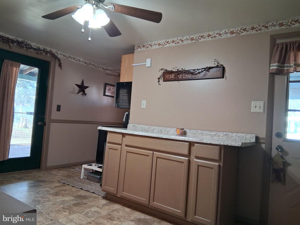 Photo of 415 Rolling Stone Road, KYLERTOWN, PA 16847 (MLS # PACD2045066)