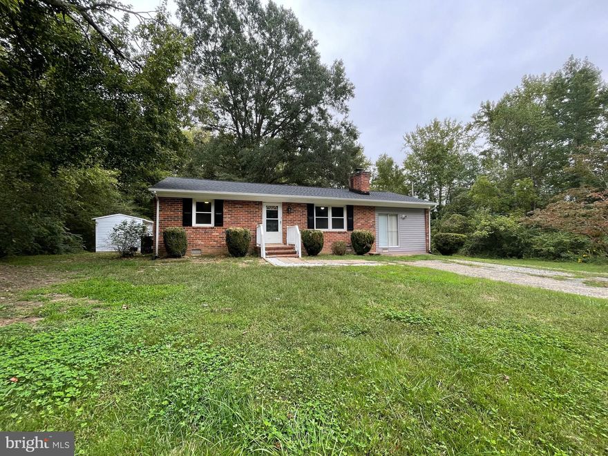 $10,000 PRICE DROP AND OPEN SATURDAY AND SUNDAY FROM 12-3!

Are you looking for a little peace and quiet, a manageable piece of land, a fantastic location, and an affordable price for a move-in ready home? Look no more. 10 Hollywood Farm Rd. has it all. 3 BRs and 1.5 BAs on .53 acres in lovely Stafford County and conveniently located off Rt. 3, close to Shopping, Dining, Recreation and within 10 minutes of Downtown Fredericksburg and 15 minutes of Dahlgren.  

As soon as you drive up, you notice the country feel, a level back yard, ample parking, a brand new roof, beautiful black and white exterior accents--just a lovely home. Upon entry into the foyer there is a large hall closet and gorgeous refinished hardwood floors throughout. The LR has a Brick FP with beautiful wooden accent walls framing it. The well appointed Kitchen features New SS appliances, freshly updated deep blue cabinets, stylish Quartz counters, coordinated  Luxury Vinyl Tile with ample space for a DR table--yes- the Kitchen is that large. There are two BRs located on one side of the home which feature refinished hardwood floors, new mirrored closet doors, two windows in each, and new fans with lights. The newly remodeled Full Bath is highlighted with a energy efficient, Thin Q LG Washer/Dryer set, Double Honey Walnut Vanity with White Sinks, Tub/Shower, Sep Linen Closet and all accented in White. The third BR is on the opposite side of the home with a Sep BR and Living Area, Large Closet, High Ceilings, and many Windows which has been newly carpeted with a plush neutral gray. As a bonus, there is a brand NEW Half Bath in the Hall. This remodel includes all New Lighting, New Six Panel Doors, New Hardware, and a Fresh Palate of Grays and Whites gracing the walls. All Brick and Fully Remodeled. Make your appointment today!  It is move in ready and waiting for you to call it Home Sweet Home.