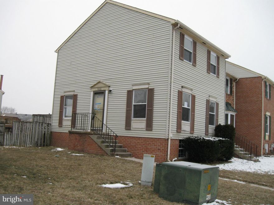 Water privileged community that offers boat ramp, moorings & picnic area.  End unit town home with side main entrance and door off kitchen to huge rear deck and privacy fenced rear yard. Upgrades in the past to include floors, hvac flooring & more. Lower level is finished with family room & 1/2 bath. Upper level has 3 bedrooms and 1 bath. Open floor plan on main level. Close to schools.