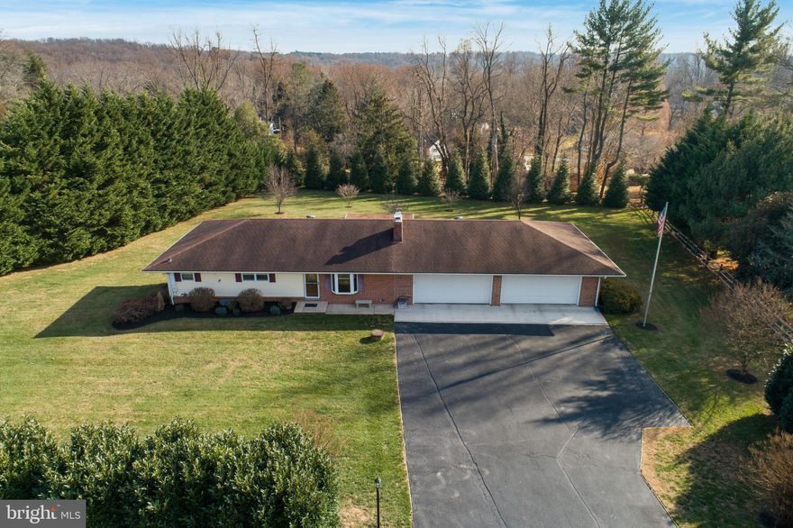 OFFER DEADLINE SUNDAY THE 16TH AT 7:00PM-This is the home you have been waiting for! 1+ ACRE with over 2600+ SQFT of FINISHED SPACE As you pull onto the freshly sealed driveway you are greeted with a meticulous lawn and an abundance of landscaping to create privacy from neighbors. The massive 4 car garage can fit all your toys, tools, and garden supplies on the custom built shelving and walk-in closet. Two of the garage parking spots are extended for larger SUV's or trucks! As you enter the home you are greeted by the open floor plan and gleaming refinished hardwood floors. The living room is spacious with a wood burning fireplace, recessed lighting, and large bay window. The recently renovated kitchen offers plenty of cabinet and counter space making meal prep a breeze. To the right is the dining room with an additional pantry for all your kitchen gadgets and supplies. Down the hall are 2 large bedrooms and an updated hallway full bath. As you continue down the hallway you will find the primary suite with an attached full bath with a single vanity and jetted tub/shower. Do you need more space? The lower level was finished in 2010 which almost doubles your square footage with a very large family room, extra 4th bedroom, additional full bath, and a den/office. The tall ceilings and walkout level make the basement feel open and airy. The lower level is ready for your touches with all NEW carpet! Looking to entertain or add a pool? The 1+ acre lot allows you to spread out and feel private as it is surrounded by tall trees. The back sunroom is a great place to relax and sip your morning coffee. Lastly, don't ever worry about losing power with the whole house generator with a seller owned propane tank. Schedule your showing today to see all this home has to offer!