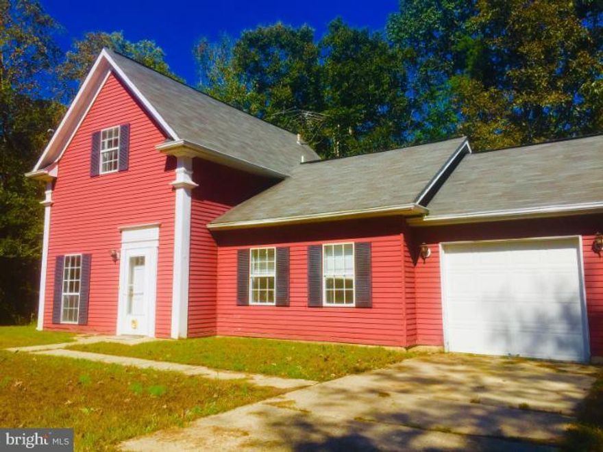 Great home in private setting. Huge yard and just minutes from Town of La Plata. Freshly painted and carpets professionally steam cleaned. Family room has cozy wood burning fireplace.