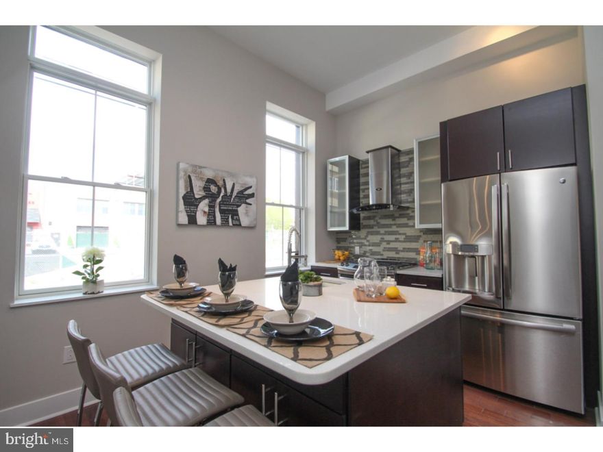 Spectacular Fishtown multi-level unit ready for immediate occupancy. First level features beautiful hardwood floors, living/sitting room area, contemporary kitchen with quartz counters, and stainless steel appliances. Second floor is huge master suite with spacious bedroom area and ultra modern bathroom ceramic bathroom.  Lower level contains one sizable bedroom, full ceramic bath and additional room which is ideal for office/small bedroom.  Over 1400 sq ft of living space!  Great location!  Convenient to public transportation, Memphis Taproom, Pizza Brain, Philadelphia Brewing Company, Soup Kitchen Cafe, and much more!