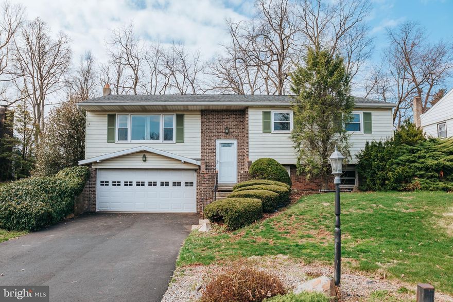 Welcome home to a move-in ready split-level in Denver with easy access to Route 222 and the PA Turnpike, just a short drive to Lancaster or Reading.  This charming split-level home offers the perfect blend of space, comfort, and functionality with multiple living areas.  Well-maintained, it has 3 bedrooms, a full bath with a tub shower, and an en-suite and walk in closet in the primary bedroom.   The eat-in kitchen with a breakfast bar has a sliding door to the trex deck where it is  perfect for outdoor dining in your private backyard.  The new closet systems save a lot of space.  A finished lower level features a  brick hearth and wood burning fireplace.  A convenient half bath and a laundry room are in the basement as well.  Washer and dryer stay.  Updated roof, window, door, heating/cooling system in 2019 with a resurfaced driveway in 2024.  An attached 2 car garage completes the package.