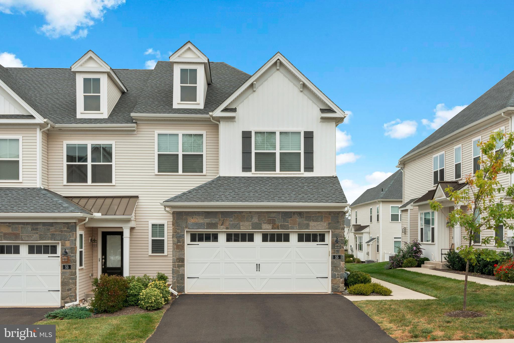 Welcome to this exceptional end-unit townhome located in the highly sought-after Reserve at Spring Mill community, within the award-winning Council Rock School District. Featuring 3 bedrooms, 2 full bathrooms, 2 half bathrooms, and an attached 2-car garage, this residence beautifully blends style, comfort, and functionality across all three levels.
Step inside and immediately notice the attention to detail and high end upgrades throughout. The first floor offers an open concept layout designed for today’s lifestyle, allowing for a seamless flow between the living and dining areas. Gleaming hardwood floors span the main level, while the living room is anchored by a striking stacked stone electric fireplace, adding warmth and character to the space.
The kitchen is a true showstopper, featuring a large quartz island with seating, stainless steel appliances, a built-in wine fridge, under cabinet and island lighting, and a spacious pantry. Whether you’re hosting a gathering or enjoying a quiet night at home, this kitchen was designed to impress. Step outside to the composite deck and savor the summer months with ease. A convenient powder room and direct garage access complete this floor.
Upstairs, the primary suite offers a private retreat with two walk-in closets and a luxurious en-suite bathroom featuring a dual-sink vanity and modern finishes. Two additional generously sized bedrooms, a stylish hall bath, and a full laundry room provide both comfort and convenience.
The fully finished lower level expands your living space and is perfect for entertaining , featuring a gorgeous custom bar with quartz countertops, wine fridge, and an additional half bath. This versatile space can serve as a recreation room, media room, or home gym.
This home truly has it all, from thoughtful upgrades to an ideal location close to shopping, dining, and major commuter routes. If you’re looking for a turnkey property that balances luxury and practicality, this is the one
