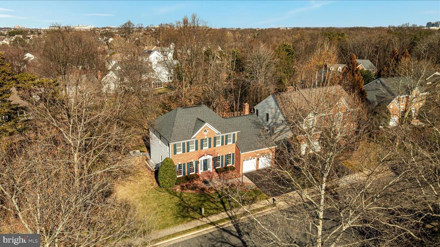 **OPEN SATURDAY, JANUARY 24 from 12 to 3** Feel the love poured into this home that the Original Owners have meticulously customized and maintained! Brick Front Home with walk out lower level, Deck, and Patio on .31 acre lot with fenced rear yard backing to open area. Creature Comforts(!) include two wet bars | Spa finishes of refurbished Primary Bath with pocket door, heated floors and towel warmer | Kohler Workstation sink, GE Profile appliances, and pull out Cabinetry in Kitchen | Customized Mudroom/Drop Zone | Exercise Room | Two Offices + 4 Bedrooms | 4" Hardwood Floors, Plantation Shutters + Up/Down Blinds, 5 Ceiling Fans, Recessed and Designer Lights | Built in Storage Shelving in Basement and in Garage | AZEK Composite Deck + Stamped Concrete walk and Patio | Irrigation system. GAS for cooking, heat, and water heater. NEW Water Heater, Refrigerator, Dishwasher, Carpet. NEWER HVAC, Roof, Siding, Fence, and additional appliances -> Detailed list of improvements available at house. Extensive paved paths, tot lot, picnic area, and sports court in Community. Fabulous location close to employment hubs, shopping, services, metro rail, and Dulles Airport (but not in the flight path!)