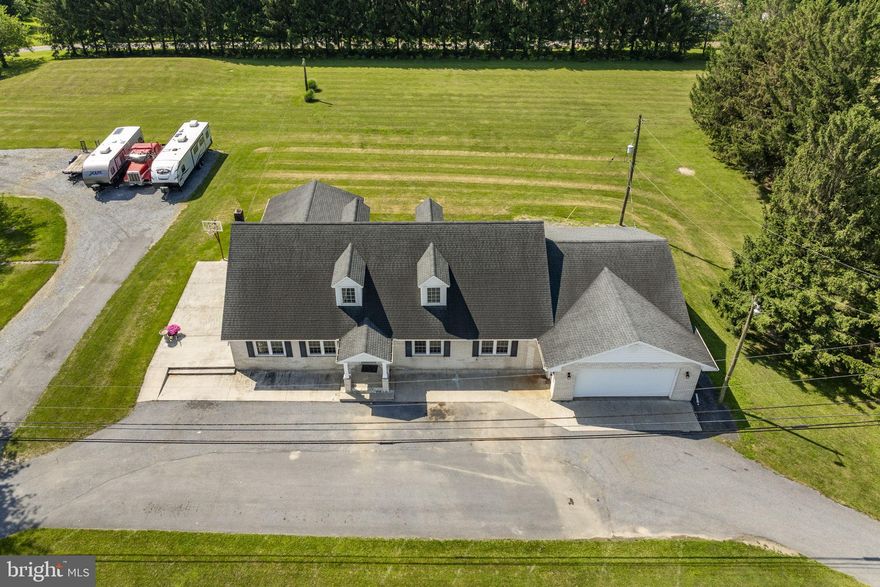 Fantastic Commercial Opportunity on Route 22 - Zoned C-2 Highway Commercial. This 4.08-acre flat, cleared parcel is zoned C-2 Highway Commercial, allowing for a wide range of permitted uses including retail, automotive, hotel, office space, bank, school, and more. With a high-visibility location along Route 22 with easy access to Routes 78 and 81, it's in an ideal spot for attracting both local and through traffic. The property currently features a remodeled residence that could serve as a temporary office or be repurposed for future development. Taxed at residential rates if not used for commercial operations, offering holding flexibility for investors or phased development. Endless potential for business development in a strategic location with excellent road frontage and accessibility.