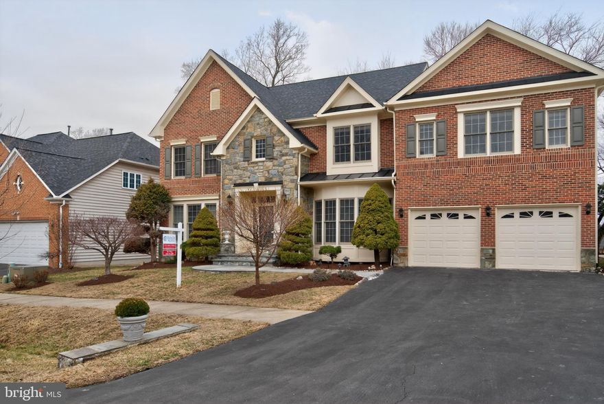 WELCOME TO THIS STUNNING BRICK AND STONE FRONT COLONIAL, BUILT IN
2010 AND METICULOUSLY MAINTAINED BY ITS ORIGINAL OWNERS. PERFECTLY
LOCATED IN DESIRABLE SILVER SPRING WITH EXCEPTIONAL CONVENIENCE TO
WASHINGTON, DC, THIS HOME OFFERS THE IDEAL BLEND OF ELEGANCE, SPACE,
AND ACCESSIBILITY.
A  two-story foyer introduces a light-filled, thoughtfully designed floor plan. The main
level features a private office with bay windows and French doors, formal living and dining
rooms, and a breathtaking two-story family room anchored by a floor-to-ceiling stone fireplace
and expansive windows.
The spacious kitchen showcases a granite island, abundant cabinetry, and a bright breakfast nook
that flows seamlessly into the family room — ideal for everyday living and entertaining.
Upstairs, five spacious bedrooms and three recently renovated bathrooms provide exceptional
comfort. The luxurious primary suite features cathedral ceilings, a sitting area, two walk-in
closets, and a spa-inspired bath with a standalone soaking tub and oversized shower. Dual
staircases add architectural charm and everyday convenience.
The fully finished walk-up lower level expands the living space with a large recreation area,
sitting area, granite wet bar with wine cooler, private bedroom with walk-in closet, full bath, and
an additional flex room perfect for a gym, office, or media room.
Outdoor living shines with a spacious deck and gazebo overlooking the fenced yard, plus a
beautiful stone patio below — creating a seamless indoor-outdoor retreat.
Additional updates include a newer roof (2019) and gutter guards for peace of mind.

An exceptional opportunity to own a beautifully appointed home in a prime commuter location
near major routes, Metro access, and downtown DC.

Disclosure: Owner is RE licensed
