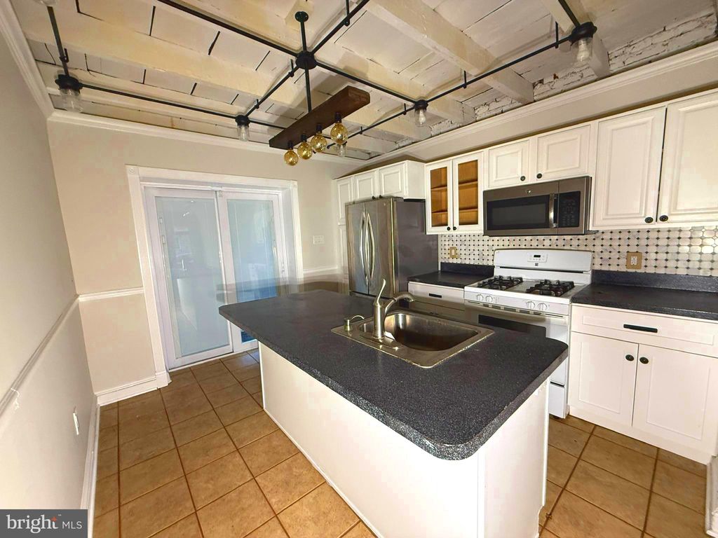 Photo of 2529 Fleet Street, BALTIMORE, MD 21224 (MLS # MDBA2195300)