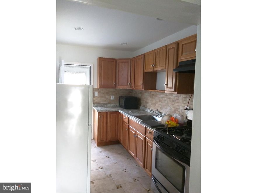 You won't be disappointed in this small but very comfortable home that offers much. Good size living room and dining room. Both bedrooms also have ample living space with good size closets. Renovated throughout. New Leminate flooring throughout, tiles in the kitchen and bathroom. Everything in bathroom and kitchen is new. Laundry in the basement and half a bathroom. There is a backyard which is great for bbq and entertainment. Location, location, location is also a WINNER! Walking distance to public transportation and just minutes from Center City. Close to major roads and highways.