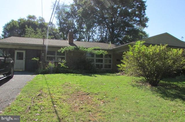 Sizable ranch style home in desirable Green Lane Farms development. 3 bedrooms and 2 baths. 2 fireplaces. Carport was converted to a screened in patio. Partially finished lower level.