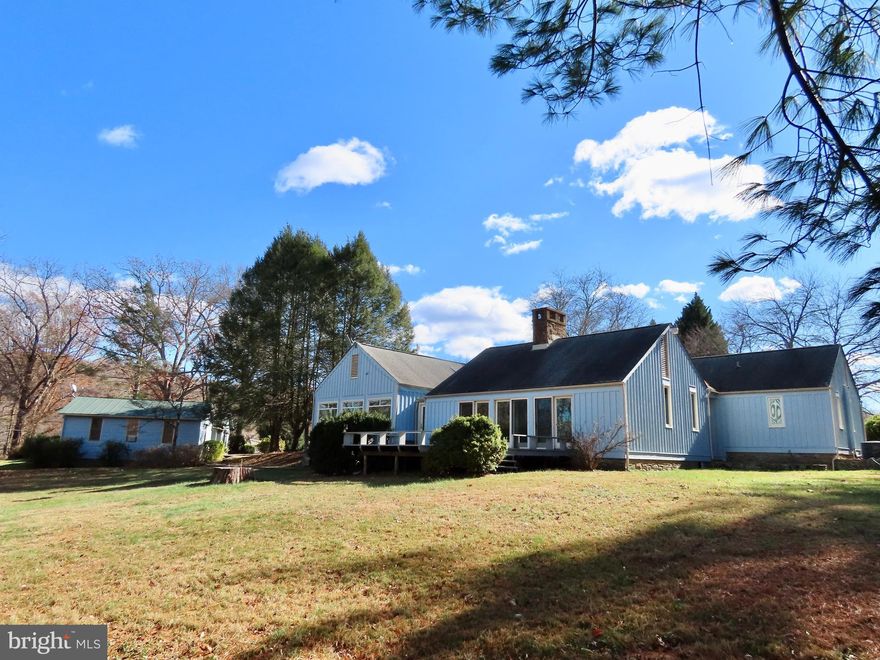 A HOME FOR ENTERTAINING, with a GUEST HOUSE & LIBRARY /OFFICE plus an INDOOR POOL make quite a surprise package on 36 acres in Thornton Hill Hounds fox hunt territory.  The residence was created for entertaining and once hosted President Reagan and other dignitaries.  Two stone fireplaces and spacious rooms for art, books and displays.  Guest house offers two bedrooms and a beautiful private office-library.      In all,  a sturdy, ample, and intellectually interesting property.  Spectacular views of the Milky Way. Not far from Shenandoah National Park hikes. An early tenant house has a separate driveway and needs full remodel but is a nice addition for guests or possible tenants.  A great place for families and friends to enjoy the delightful community of Rappahannock County.  A good hour west of the beltway near the Blue Ridge Mountains.