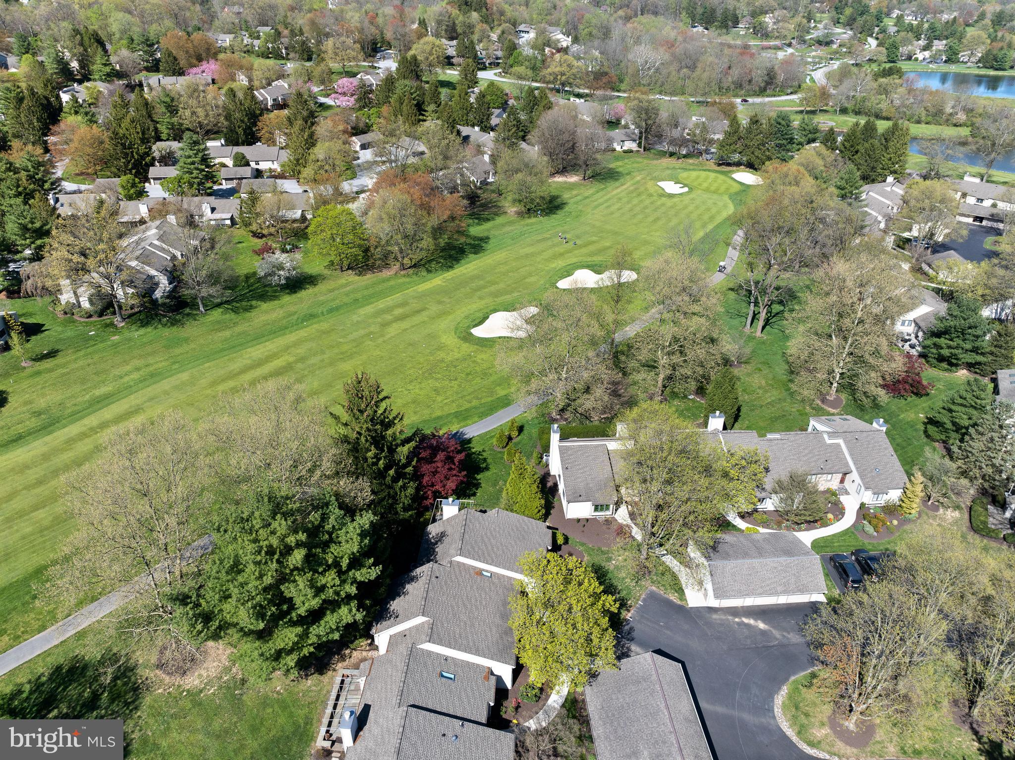 Highest and BEST OFFERS DUE BY 5:00 4/28 - OPEN SUN. 1 to 4 - Excellent Location on the 8th Fairway - Sunny Updated END UNIT w/ part. fin Lower Level in ACTIVE 55+ Community of Hershey's Mill- perfect when U R Ready for the easier way of Life!  If you are looking for low maintenance  & "Lock & Leave" - this home checks all the boxes - esp. the ones on your "Still Need" List!  Great Shape & Wonderful views from private big Deck,  Southern Exposure on front of house, w/ "Helibore Heaven" perennials lining the new sidewalk to flagstone front entrance.  Lots of NEW in Eaton Village - NEW Roof & Siding, & renovated PRIVATE POOL is just a block away! Enter the Foyer that has doors to Kitchen, Lower Level, & Hallway to BRs - best of all- your eyes are drawn to the straight thru views into the Living Room & Sliding Glass Doors to Deck & your outside Living Space! Fantastic fiews of the 8th Tee Box, Fairway & Green.  Cart Path is the start of trail system that takes you to the Clubhouse, the Gardens, the Ponds, Tennis, Pickleball, Bocce, Wood Work Shop -you want it? They have it!  Even a 1 year Social membership to the club when you buy-  Sweet way to start the next chapter of your life & meet lots of fun people! Throughout the home are upgades like nice trim/millwork & pocket doors but the spacious room size is a winner! Kitchen has updated stainless appliances, 2 Pantries, granite counters & Island, & best is it's open to a SUNROOM that's a nice place for your table - w/ blt-in seat & golf course views of course!  EZ to entertain w/ this Marlborough floorplan that has hdwd. flrs. in Living Rm that run into the good sized Dining Room w/ 2 lighted corner built-in cabinets - pefect place for some of your favorite things! Nice trim moldings & pocket door are upgrades found thru out this Home.  Wide open entrance to the Living Room, which has a fireplace for winter nights & holiday parties, & new ceiling can lights bring light in on dark days, when Mother Nature doesn't provide light thru all the windows.  The Hallway on other side of Foyer has coat closet & linen closet, & "Solar Tubes" that let the natural light in all day long! Walk past the Hall Bath w/ tub, & next to it is a Big Laundry w/ built-in cabinets.  On the front of house is a sunny Bedroom w/ blt-in seat & shelves, & the 3rd Bedrm is in front corner of house & being used as a Cozy DEN - w/ 2 walls of built-ins.  Head back to the spacious MBR w/ new hdwd. flrs. & again your eyes are drawn to the private peaceful views out back- which are seen above the blt-in seat & thru the glass Doors to Deck.   2 walk-in closets w/ auto lights of course, dressing table w/ sink, & separate room for the Loo & large Shower w/ newer glass doors & tile.  The Lower Level makes this home just what you  want - when Guests need a place to have some privacy or your children need to boomerang for a little visit!  There is a full Bath, w/ doors to Bedroom & the Hall.  Handy Office ready for you to Work- if you really have to!  If not it can be another Bedroom, Craft Room, Studio.... But not storage - as there are 2 HUGE rooms for that - w/ lots of blt-in shelves, a work bench, & even a large Cedar Closet.  New carpet down here makes it ready to just move in, as do the sofas, desk, & cabinets which can be included in the Den.  One Car Garage has cabinets for storage & trash shed on the side.  One of the best features of this home are the dedicated home owners that work together to keep Eaton Village NICE & DESIRABLE w/ well kept exteriors, manicured gardens & blooming trees - a warm & welcoming community within the bigger Hersheys Mill - where your Lifestyle can be as Busy or Private as you choose!  As the villages in "the Mill" were built alphabetically, Eaton Village was at the beginning of the build, a solid home where the residents take great pride in helping to maintain the beauty & ambiance found only in Eaton Village!  Check out the link for the virtual tour or check it out in person!