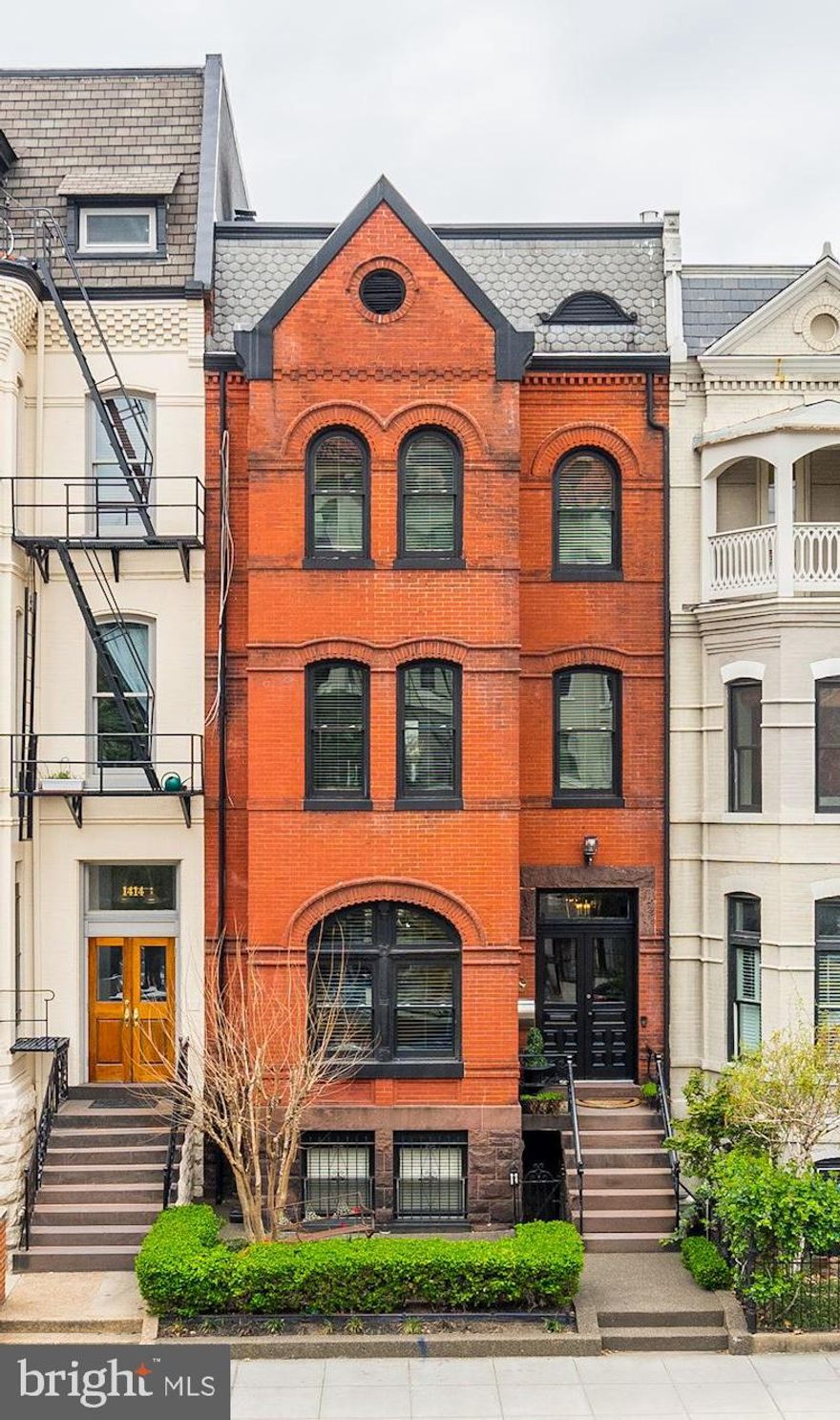 Here is your once in a lifetime chance to own a piece of Washington DC residential history. This townhome stands tall with it's Federal style in the heart of Logan Circle while bordering DuPont Circle. Step inside this entertainers dream and you're greeted with solid oak floors, triple crown moulding, gas fireplaces, Santa Cole chandelier and tons of bright light.  The kitchen offers carrera marble, Viking appliance suite and french doors to your walk-out deck. The second floor features a guest bedroom and a abounding master suite. You'll love the living room area, his and hers closets, marble appointments in the spa-like bathroom, Hans Grohe fixtures and a large soaker tub. Upstairs features two additional bedrooms with a large den with wet bar. You'll also have a full English Basement with nearly 1000 square feet of living. At the corner of 15th and P you're steps away from Whole Foods, tons of restaurants and bars, shopping and major walkability. Don't wait, this home will not last long!