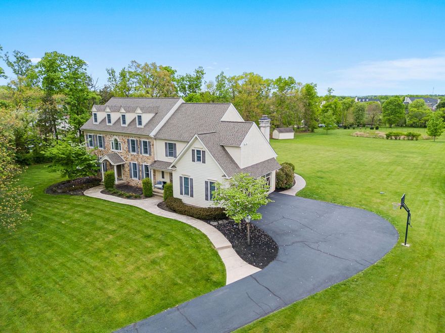 Nestled in the highly sought-after Ashbourne Estates, this stunning Colonial blends luxury, comfort, and everyday livability across more than 4,400 square feet of beautifully designed space. From the moment you step into the grand foyer, the home feels warm, welcoming, and made for both entertaining the most sophisticated events to everyday relaxing and enjoyment.  
The dining room is perfect for hosting gatherings, featuring a gorgeous tray ceiling and a full butler’s pantry with a wet bar and dishwasher for added convenience. The gourmet kitchen is truly the heart of the home, complete with high-end appliances, a commercial-grade side-by-side oven, a striking dark copper hood, and an abundance of granite countertop space. The oversized two-tier island makes entertaining effortless while still being ideal for everyday meals.
The open floor plan flows seamlessly into the spacious family room and expansive casual dining area designed to comfortably accomodate large gatherings and everyday living.  Surrounded with views of the open yard and in proximity to the kitchen so the chef never misses out on the conversation. The family room features brand-new carpet and a beautiful natural stone fireplace that creates the perfect cozy atmosphere. Looking for a quieter retreat? The formal living room offers oversized windows with private, peaceful wooded views. Just off the living room is a fifth bedroom with its own bath, making it an ideal setup for an in-law suite or private guest suite.  
Upstairs, you’ll find four more generously sized bedrooms, including an incredible primary suite designed to feel like a true retreat. Enjoy a large sitting room, two separate walk-in closets, and a luxurious primary bath featuring two private commodes, a dual entry shower, built-in vanity, and a soaking tub all surrounded by tons of natural light. Two additional bedrooms share a Jack and Jill bathroom while  overlooking the expansive backyard.  The 4th bedroom is such a unique delight boasting a hand crafted coastal mural in it's generous space while also containing its own private full bath.
Need even more room? The finished bonus room over the garage offers endless possibilities and even has room to add another full bathroom for an additional en suite. The sizeable upstairs laundry room adds convenience with extra storage and countertop space. A rear staircase leads down to the mudroom, complete with built-ins, two closets, and a second powder room with easy access to the garage, kitchen or the front of the home. 
The unfinished basement offers an incredible amount of storage and plenty of flexibility for a future gym, hobby room, or finished living space customized to your prefrences. 
Outside, the 1.84-acre lot provides a private, serene setting with a flat backyard perfect for entertaining, play, or simply relaxing. Enjoy evenings on the expansive paver patio or unwind in the hot tub while taking in the peaceful backyard oasis. Utilize the pole barn shed for the exterior maintenence items and leave the 3 car garage for parking your vehicles!  The long driveway provides ample parking and a great space for outdoor basketball! No need to worry about big ticket items.  This home has had a new roof, new garage doors, new grinder pump and a new water heater all in the last few years.  912 Ashbourne truly offers the perfect blend of luxury and comfort, with thoughtful details and versatile spaces throughout. Make it your new home today!
OPEN HOUSES THURSDAY AND SATURDAY WITH PRIVATE SHOWINGS AFTER 2PM ON SATURDAY 5/16.