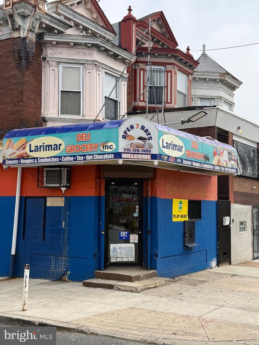 Once in generation opportunity. 1431 S 58th Street, Philadelphia, PA 19143 presents a rare mixed-use opportunity in a prime corner location. This 1,782 square foot property sits on a 1,333 square foot lot and is zoned CMX-2, allowing for a wide range of commercial and residential uses. The first floor features a very successful beautifully maintained, modern grocery store complete with a deli counter, commercial-grade refrigeration, reach-in refrigerators, lottery setup, and slot machines—creating a convenient neighborhood hub. The space is equipped with a full camera security system throughout, providing added peace of mind for business operations. Above the commercial space, the property offers a spacious 3-bedroom apartment with a large kitchen. With a separate entrance, the residential unit is ideal for rental income or owner-occupancy. The current tenant lease is set to expire shortly, presenting an excellent opportunity for an investor or owner-user to step into a turnkey setup or reposition the asset to maximize value.