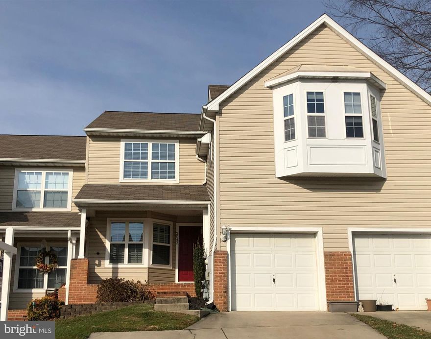 Beautiful remodeled home in sought after neighborhood.  Numerous upgrades. Gourmet kitchen, granite counter tops, S.S. appliances, wine fridge, tile back-splash, slate floors & island.  F/R with Brazilian Cherry hardwood floors, Custom wall unit, sliders to deck,  dining room with large windows overlooking private flat, fenced, back yard. Backs to woods! Remodeled basement with custom wood wet bar, gas fireplace, walk out to yard and full bathroom.  Master bath updated with soaking tub & skylight. Walk in closet.  A must see!