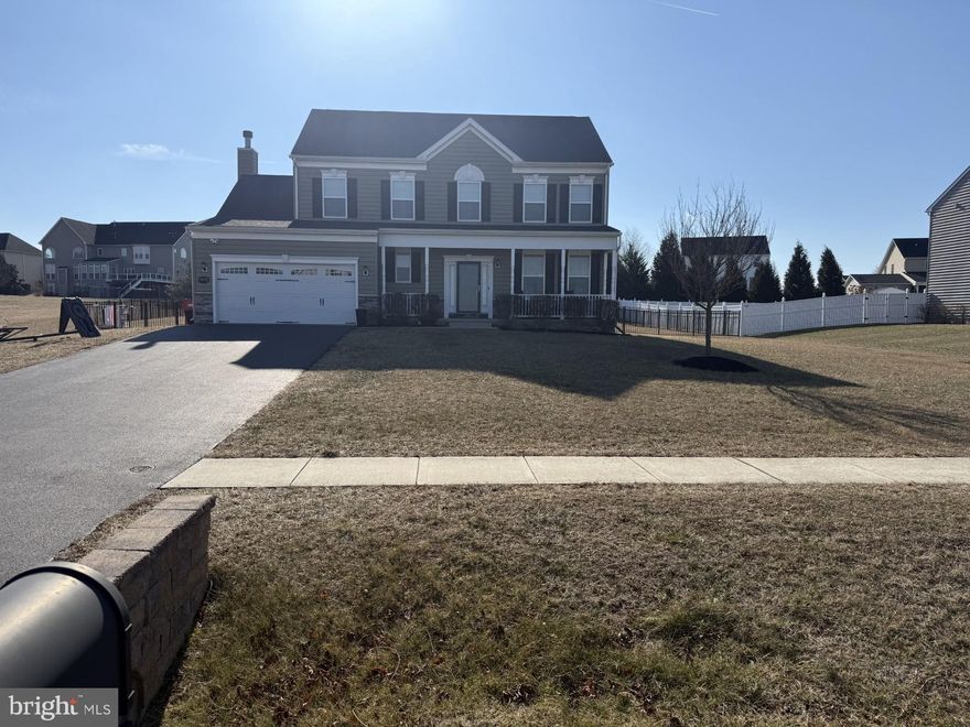 Welcome home!  A covered front porch and beautifully fenced yard sets the tone as you arrive to this carefully  maintained home!  Inside, you'll be greeted by gleaming hardwood floors and an open 2- story entryway. The main level offers a bright, semi- open layout with abundant natural light. The living room features a wood-burning fireplace w/ marble surround and built in book cases on either side. The updated kitchen offers an  island, granite countertops, and stainless steel appliances.  The main level also includes a large separate dining room and office!  Added conveniences include a half bath and main-level laundry.
Upstairs, the primary bedroom features a private en-suite bath w/ separate vanities. 
Additional highlights include custom blinds and storm door (2024/ 2025), solar panels (2025), dual water heaters,  and a professionally painted interior.  The  unfinished lower level has an oversized walk up to the rear yard.  Enjoy outdoor living on the large back patio overlooking a flat, expansive backyard—perfect for entertaining or relaxing!