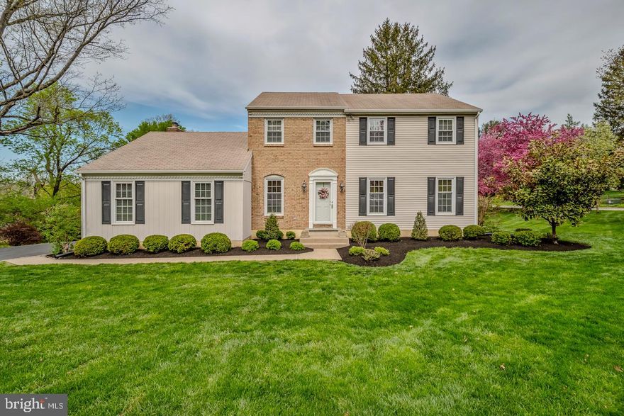 Make 8607 Elliston Drive your next home—and you will never want to leave. Perfectly positioned on one of Wyndmoor’s most coveted and private lanes, this exceptionally maintained residence sits gracefully at the rim of a quiet cul-de-sac, offering a rare blend of tranquility and convenience just moments from the heart of sought-after Springfield Township. This elegant 4-bedroom, 2.5-bath center hall colonial showcases a timeless floor plan, thoughtful updates, and a setting that simply cannot be replicated. A bright and welcoming foyer sets the tone, filled with natural light and leading to an expansive living room with picturesque views of the manicured front grounds. Designed for both everyday living and entertaining, the living room flows seamlessly into the formal dining room, creating an ideal setting for gatherings. At the heart of the home, the beautifully appointed kitchen blends classic design with modern upgrades. Features include rich oak cabinetry, striking black leathered granite countertops, a crisp white subway tile backsplash, new appliances, and custom built-ins. A charming breakfast room with an oversized bay window, while detailed wainscoting adds warmth and character to the space. The inviting family room is both dramatic and comfortable, highlighted by a cathedral ceiling, built-in bookcases, and a brick wood-burning fireplace. Oversized glass doors open to a multi-tiered deck—an exceptional outdoor living space designed for relaxing, dining, and entertaining amid peaceful surroundings. The main level is completed by a discreet powder room, an expansive laundry/mudroom, and a two-car garage. Upstairs, four generously sized bedrooms provide comfortable accommodations for family and guests. The primary suite offers a private retreat with an updated, tastefully designed en-suite bath featuring frameless glass shower doors and a spacious walk-in closet. A well-appointed hall bath rounds out the second floor. The newly finished walk-out lower level adds nearly 900 square feet of versatile living space, filled with natural light and direct access to the rear yard. This exceptional, bone-dry space is ideal for a media room, game room, home gym, office, or additional lounge area. Outdoors, mature plantings and perennial landscaping create a front yard with undeniable curb appeal, while the expansive rear yard offers privacy, a fire pit, and even one of Wyndmoor’s best sledding hills—perfect for year-round enjoyment. Ideally located just minutes from Springfield Township schools, parks, library, and ballfields, as well as the shops and dining of Chestnut Hill, Flourtown Farmers Market, Valley Green, and Morris Arboretum. Commuting is effortless with convenient access to SEPTA rail lines, Routes 309 and 476, and the Pennsylvania Turnpike. This is a rare opportunity to own a beautifully maintained home in an exceptional setting—where suburban serenity meets everyday convenience. DO NOT MISS THIS ONE OF A KIND HOME! It cannot be duplicated.