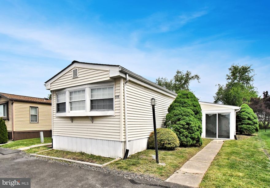 Welcome to 177 Bent Pine Hill.  This 2 bedroom 1.5 bath home is set in Neshaminy Falls a 55+ community.  It offers an upgraded eat-in kitchen, oversized living/dining room with wood burning fireplace, exposed beams and access to the sunroom offering ample storage.  Light and bright main bedroom with bow window.  2nd bedroom with bow window and access to the upgraded half bath offering a brand new vanity.  There is also a full hall bath with tub shower and laundry area off the kitchen to round out the main level.  This home also includes brand new luxury vinyl flooring through-out and has been freshly painted.  Don't miss this opportunity.  Home is easy to show and ready to go!!